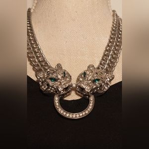 Gorgeous Necklace with Emerald like colored eyes. Beautiful and fun piece.